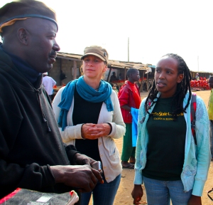 Interviewing Zambian farmers in a Lusaka market. Photo credit: Andy Kumar